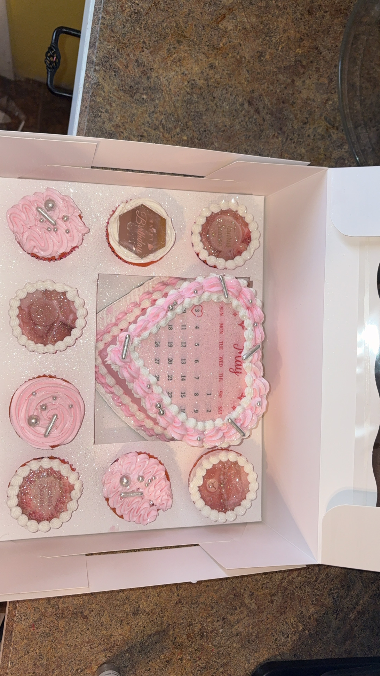 Pink birthday calendar-themed smash cake set with cupcakes